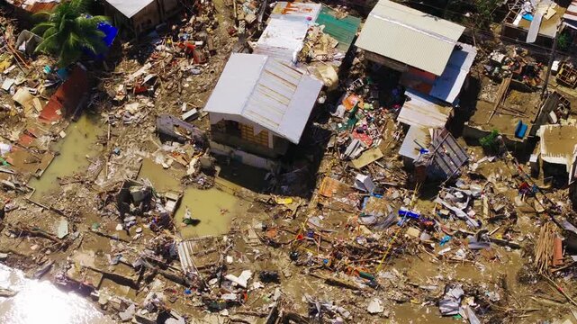 Drone view of flood damaged homes in Cebu after powerful typhoon storm