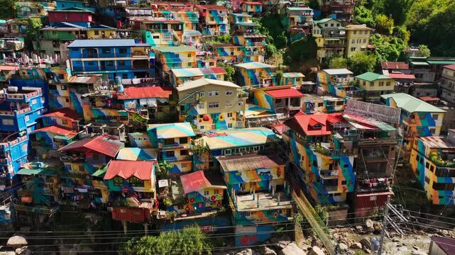 Dense colorful homes create iconic hillside artwork in La Trinidad Benguet