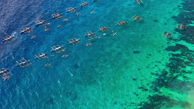 Aerial whale shark tourism boats showing Philippines global travel appeal