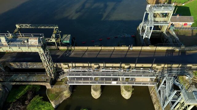 Drone view of the intersection of five rivers at Denver Sluice highlighting the industrial scale of UK water level management and drainage systems