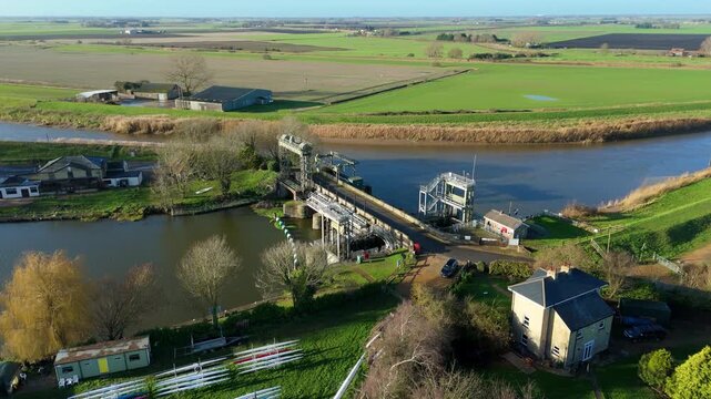 Drone view of the historic Denver Sluice flood defense system and navigation locks in the heart of the Cambridgeshire and Norfolk Fens England