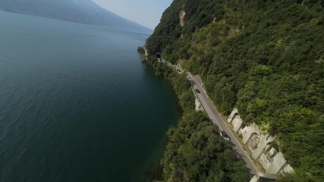 Europe Italy Lake Garda FPV Aerial near famous street Cliff and Lake 4K 60fps Slow motion possible