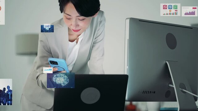 オフィスでスマホとパソコンを使う女性ビジネスパーソンとデジタルデータのコンセプトイメージ