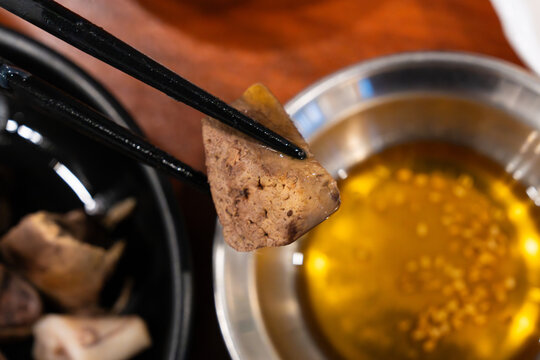 slice of steamed yellowtail liver