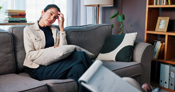 Psychologist, woman and stress in therapy on sofa for divorce grief, life transition and advice. Notes, doctor and mature patient with anxiety in CBT counseling for mental health, healing and support