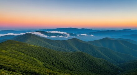 Fototapeta premium Serene mountain landscape with lush greenery and foggy hills at sunrise