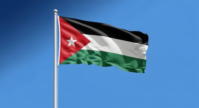 The flag of jordan waving in the wind against a clear blue sky