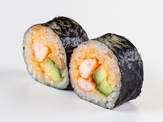 Closeup of two maki sushi rolls with shrimp and cucumber filling isolated on white. © Andrei Starostin