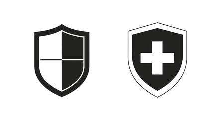 Fototapeta premium Two shield emblems one with a cross in stark black silhouette