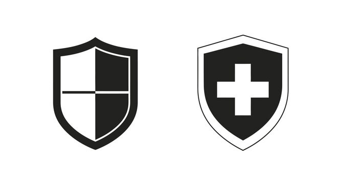 Two shield emblems one with a cross in stark black silhouette