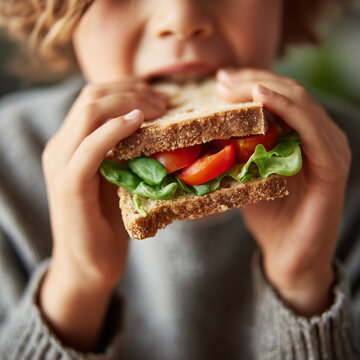 Child Eating Sandwich