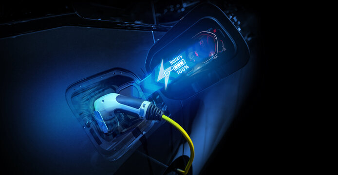 Power cable pump plug in charging power to electric vehicle EV car.