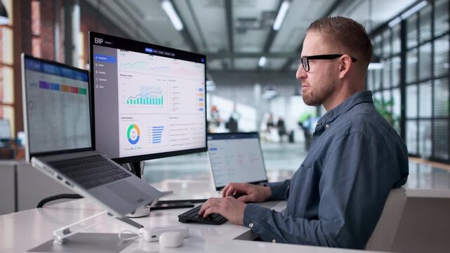 Young Businessman Using Laptop