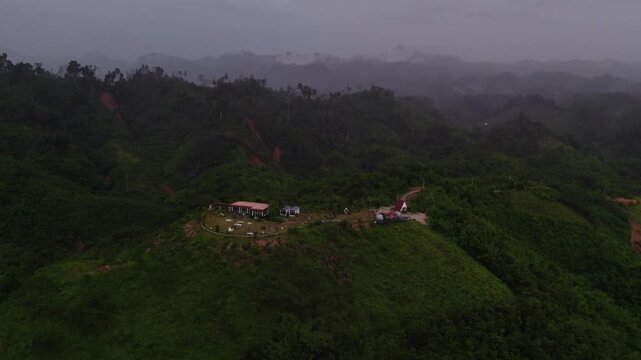 Vang Vieng, Laos - December 12, 2025: Distant view of a mounain resort in the Vang Vieng recreational area.