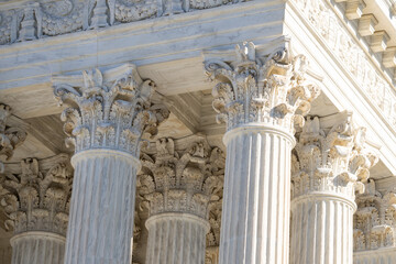 Naklejka premium Government building with timeless architecture. Court house exterior with elegant columns. Historic structure showing monumental design. Architecture shaped by strong stone columns.