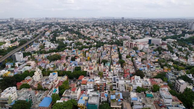Aerial view flying over a vast, densely populated urban residential area in Bangalore, India
