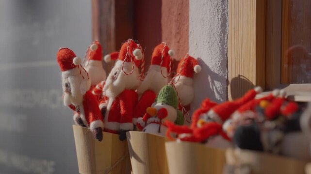 Christmas gnome figurines decoration on red festive background