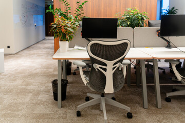 Office space with desk and monitor © KseniaJoyg