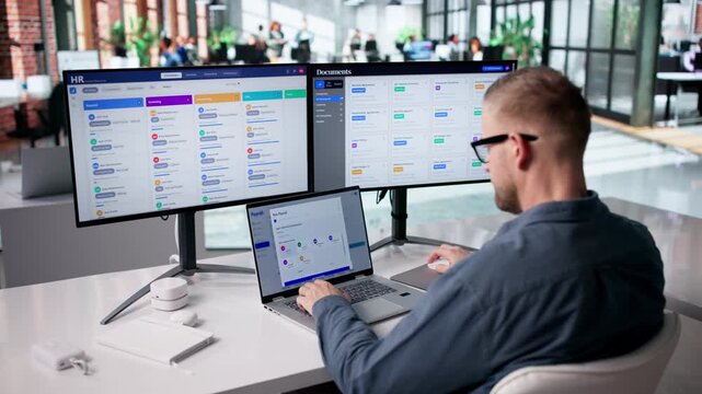 Accountant Reviewing Payroll Calculations Carefully Displayed