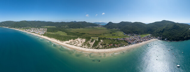 Aerial panorama of the Brazilian coast. South of the island of Santa Catarina with the views of the beaches of Acores and Pantano do Sul. Florianopolis, Brazil