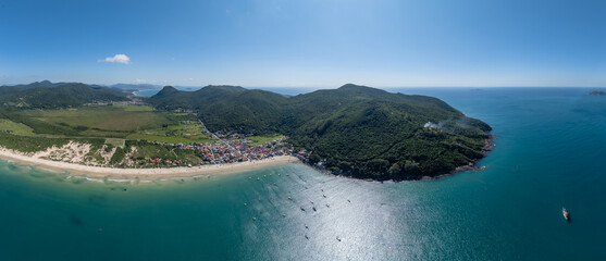 Aerial panorama of the Brazilian coast. South of the island of Santa Catarina with the views of the beaches of Acores and Pantano do Sul. Florianopolis, Brazil