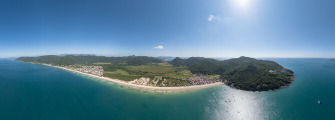 Aerial panorama of the Brazilian coast. South of the island of Santa Catarina with the views of the beaches of Acores and Pantano do Sul. Florianopolis, Brazil