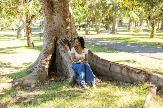 Young black female outside in a park