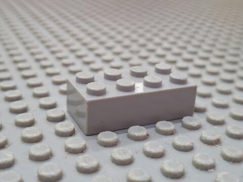 Single Lego Plastic Building Brick Toy Attached to Lego Baseplate Studded Surface for Creative Construction and Educational Play Development Hobby on December 19, 2025 in Bangkok, Thailand 