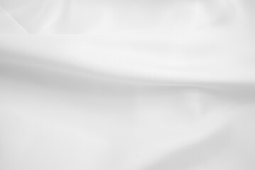 Obraz premium Close up of rippled white fabric texture background. Wrinkled cloth