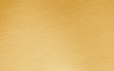 Fotobehang Goud Gold background foil golden leaf metallic texture gradient light shiny reflective wrapping paper bright yellow solid color wallpaper for design decoration element backdrop  © Chinnapong