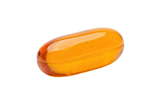 Single amber orange gel capsule with transparent softgel shell, vitamin supplement or medication, isolated on white