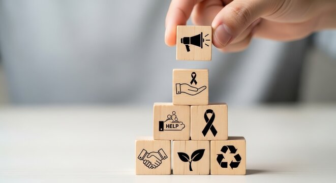 Hand stacking wooden blocks with social awareness and sustainability aspect ratio 16-9