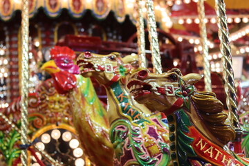 Horses and a cockerel on a funfair carousel  © Francesca Leslie
