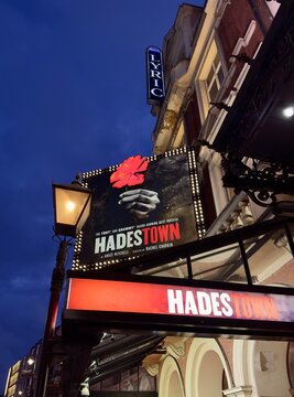 London, UK - February 7, 2026: A low angle view of the Lyric Theatre displaying signs for the show Hadestown at dusk, Shaftesbury Avenue, West End, London. 