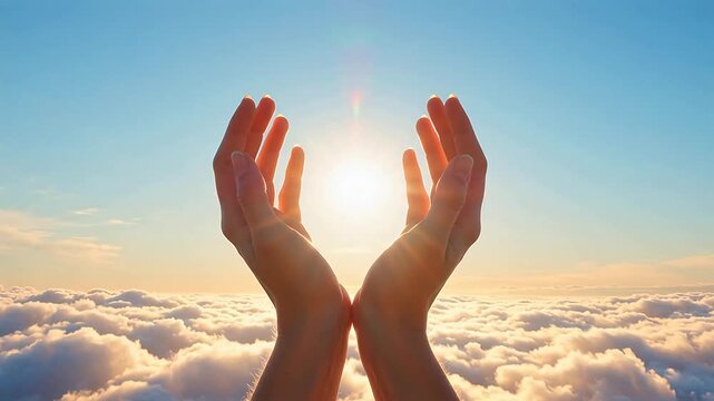 Hands reaching towards the sun above clouds