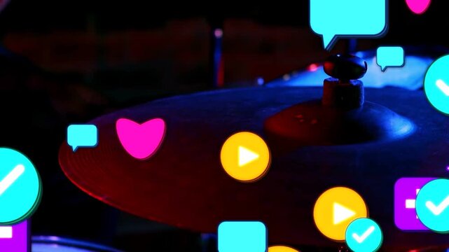 On closeup stage cymbal, animated icons spawning and rising, obscuring cymbal, showing music buzz