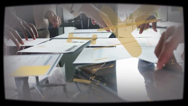 Business team spreading sheets, aligning charts on glass table, yellow overlay marking consensus
