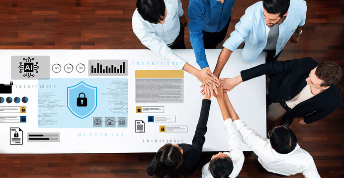 A group of diverse professionals collaborates on data security strategies at a modern workspace, showcasing teamwork with hands joined. The digital graphics symbolize innovation. Gantry