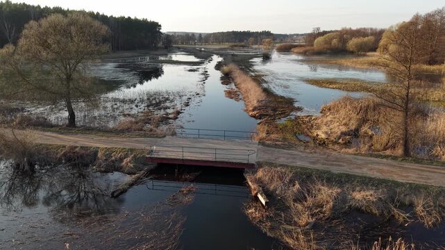Orbit Right Around Wooden Herringbone Bridge at Golden Hour