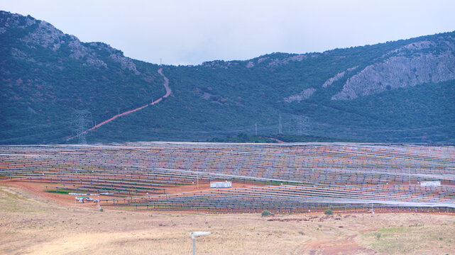 Clean Energy Transition And Sustainability Solar Panel Farm In Puertollano Castilla La Mancha Spain Against Mountain Backdrop Renewable Energy Source