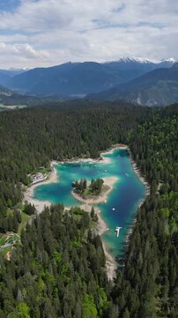Caumasee Lake Cauma in Switzerland Flims region of the Swiss Alps aerial drone vertical video