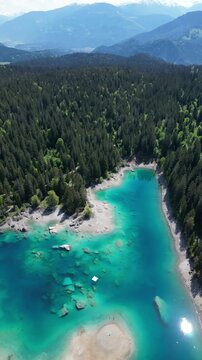 Caumasee Lake Cauma in Switzerland Flims region of the Swiss Alps evergreen forest