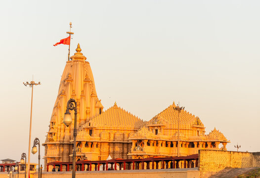 majestic somnath temple shikhara rising against clear blue sky at dawn