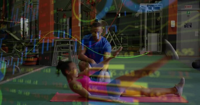 Vertical video: Coach cueing client lifting and crunching for core on mat finance charts overlaying