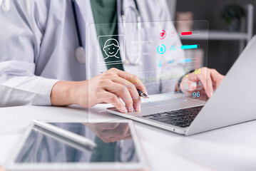 Doctor typing laptop analyzing futuristic holographic patient profile interface electronic health...