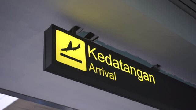 airport information arrival sign