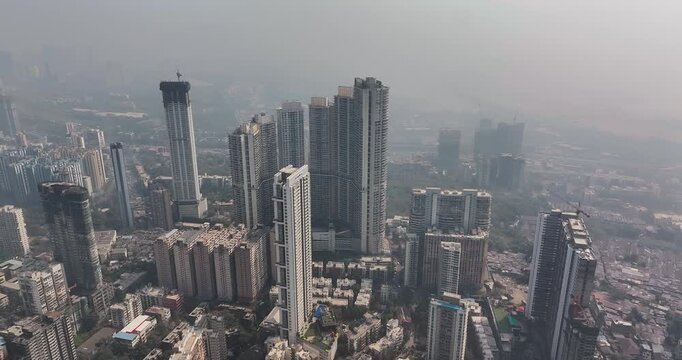 Bird&rsquo;s-eye view of Mumbai city featuring high-rise towers captured from a top-down perspective. The image highlights dense urban development, modern skyscrapers.