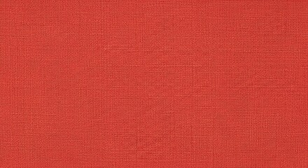 Fototapeta premium A vibrant red textured background featuring a fine and slightly irregular woven pattern, adding depth and visual interest to the surface.