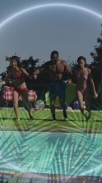 Vertical video: Friends syncing steps, jumping into pool under light arc and palm overlay for party