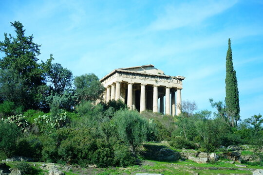 Ancient Temple of Hephaestus in the Agora of Athens, Greece, under a clear blue sky.